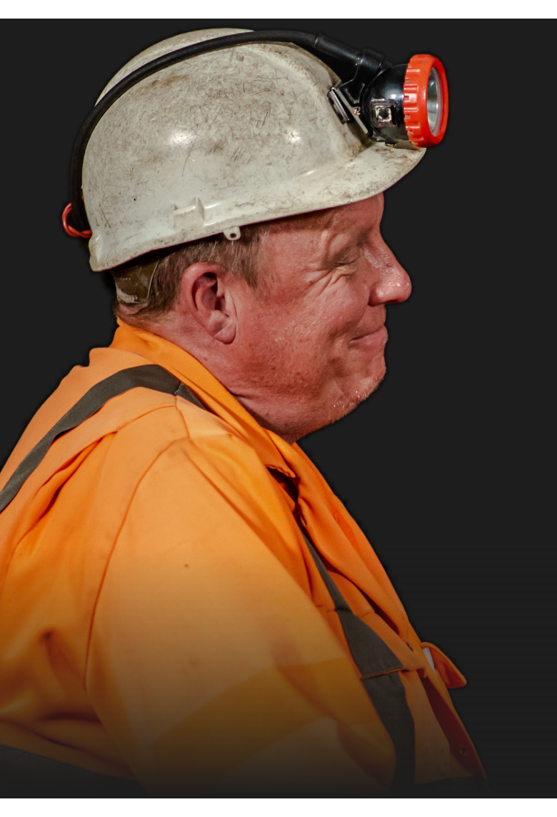 Image of a Miner looking to the right