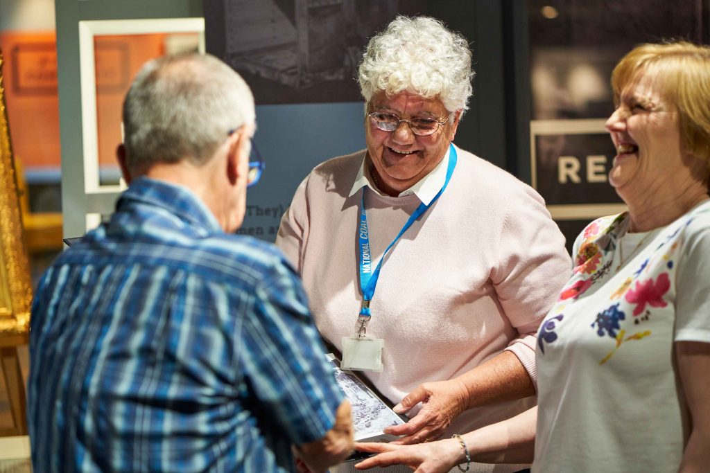 Volunteers entertaining visitors