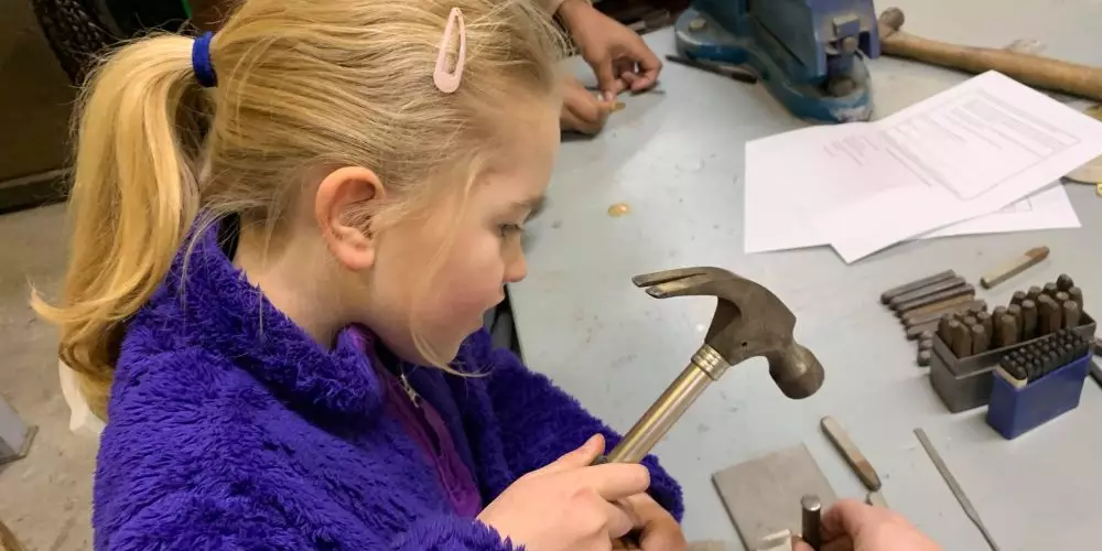 Girl Hammering