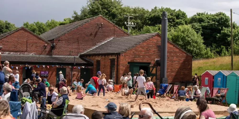 Families enjoy The Beach during the performances
