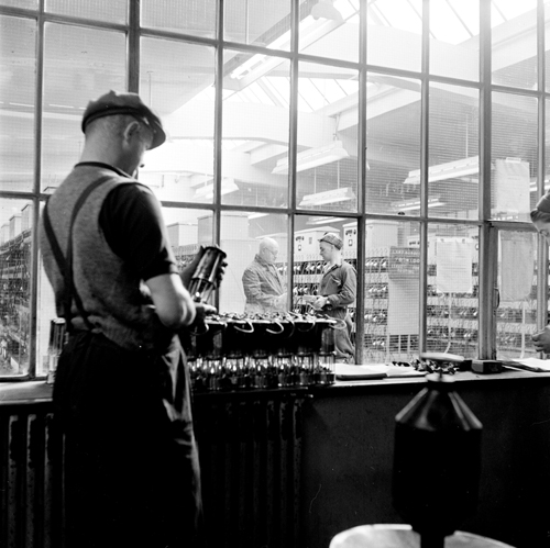 Image of Miner Checking Safety Lamp