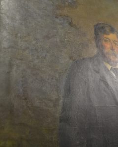 Visible areas of over-painting from earlier conservation work