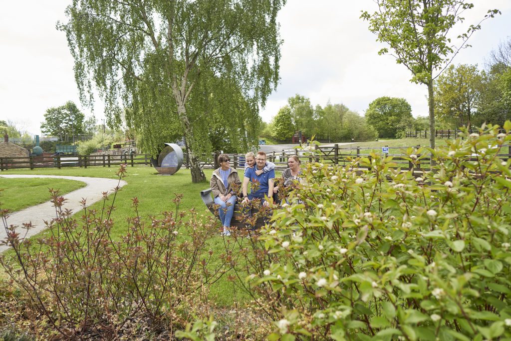 Family Enjoying the Memorial Garden