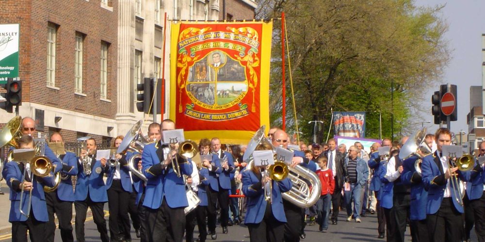 Dodworth Band and their banner marching