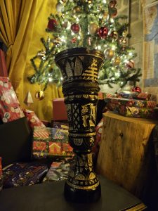 vase carved from coal, highly decorated with mining wheel and mineworkers. We’re not