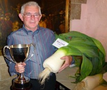 Champion leek grower Geoff Moscrop has broken two world records for his leeks. At the Cramlington, Northumberland leek show, Geoff learned his entry was officially the biggest leek ever grown, He also broke the world record for the biggest pair of leeks. The Ambler 7th October 2013