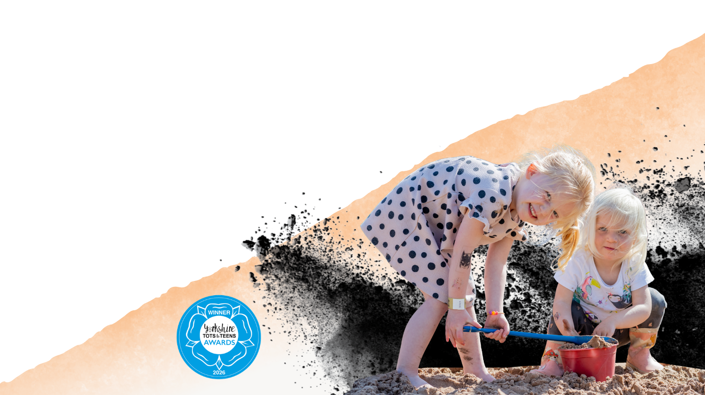 Summer Holidays - two children playing on the museum's beach