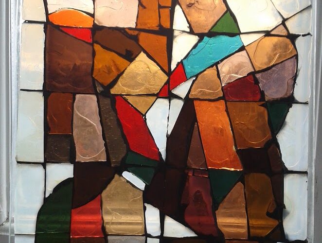 stained glass using oranges, browns and reds by ruth