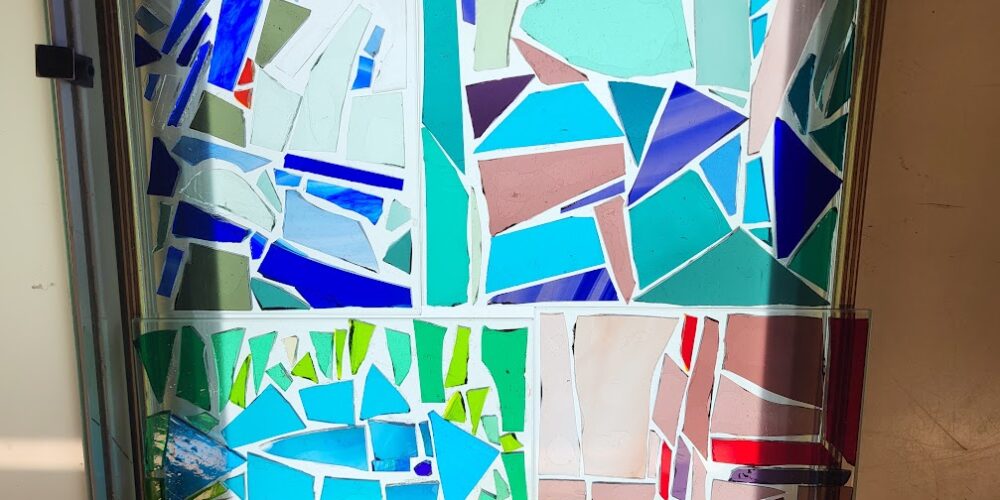 stained glass artwork, with blues and dark blues